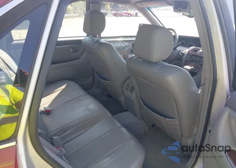 2001 Toyota Avalon Xls from USA, damaged, VIN 4T1BF28B21U146463